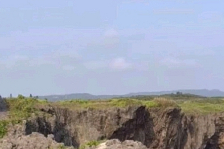 Ů100